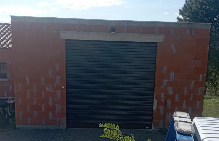 Pose porte de garage Joyeuse